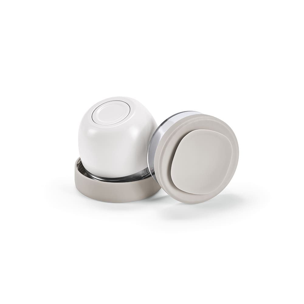 A food flask featuring two compartments, with a white and light grey design. It has a logo on the side.