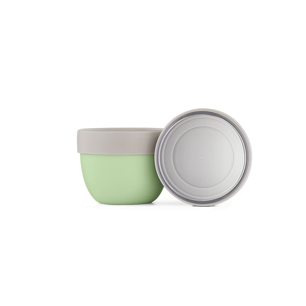 A drink bottle featuring a light green body and a grey lid, with a smooth surface and two compartments.