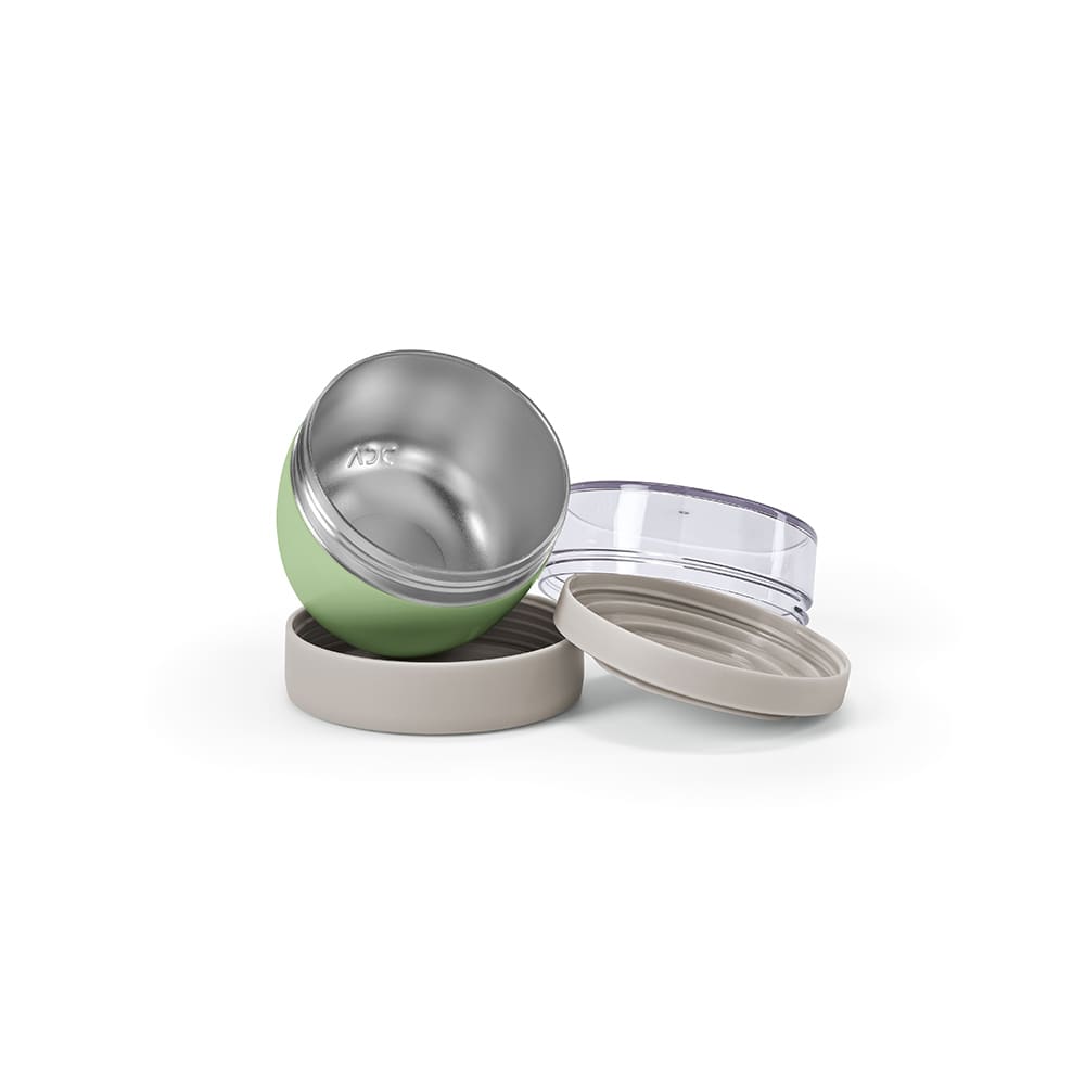 A food flask with a green exterior, featuring two compartments and a clear lid. The base is a light beige colour.