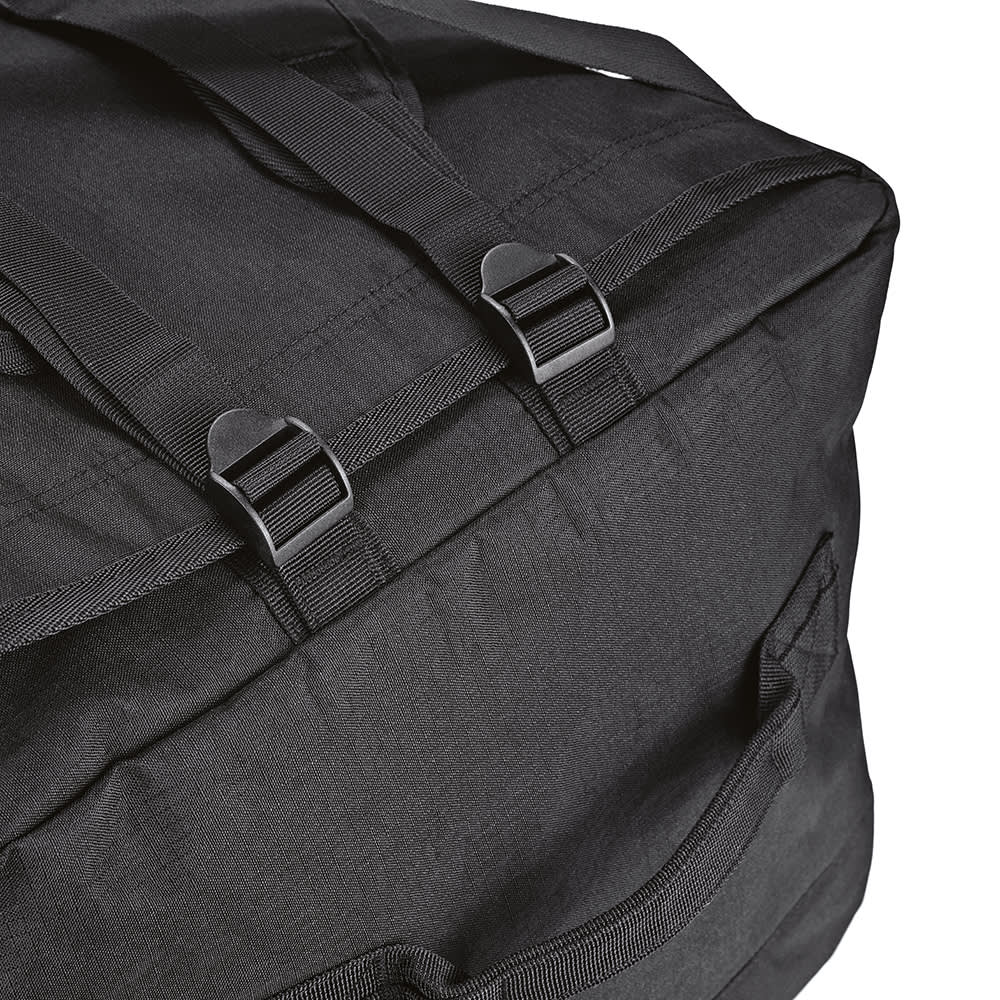 A black gym bag with adjustable straps and clips, made from ripstop material, featuring reflective strips.
