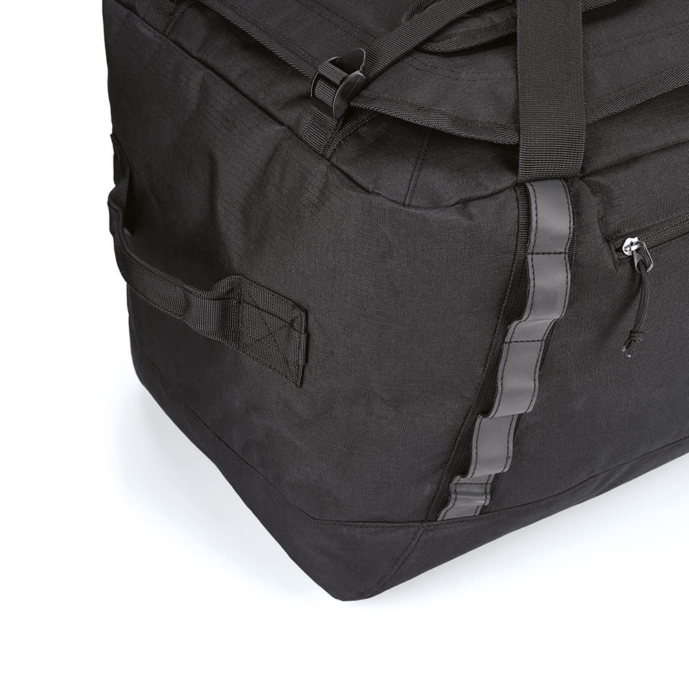 A black gym bag with reflective strips, featuring side handles and a durable design. Includes a logo on the surface.