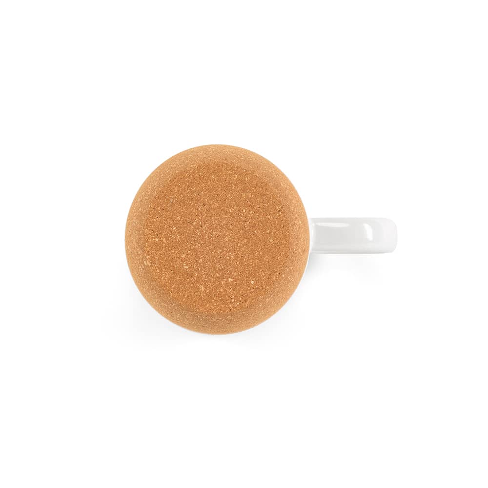 A ceramic mug with a white body and cork lid and base, featuring a handle.