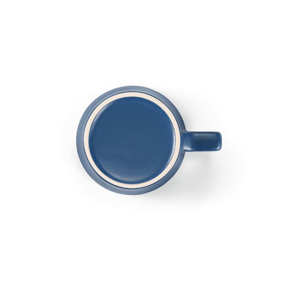 A ceramic mug with a matt blue finish, featuring a handle and a round base. It has a simple design.