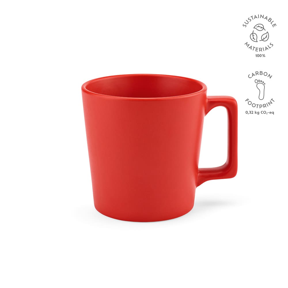 A red ceramic mug with a matte finish, featuring a sturdy handle and a sleek design.
