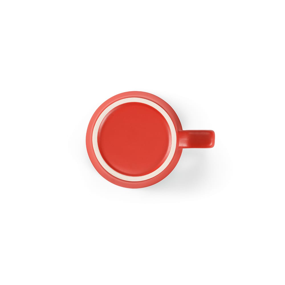 A ceramic mug with a matt finish in vibrant red, featuring a handle and a simple design.