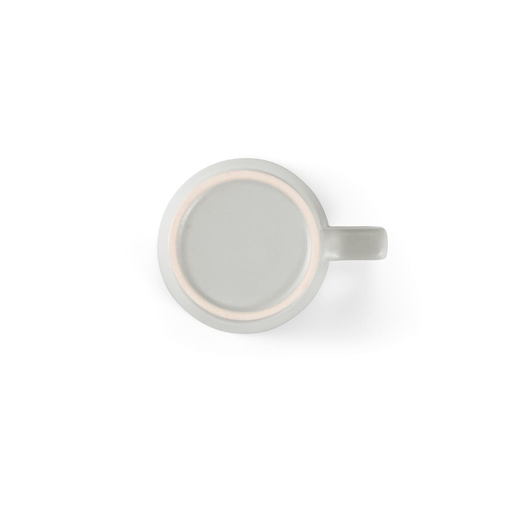 A ceramic mug with a matt finish, featuring a handle and a light grey colour. It has a minimalist design.