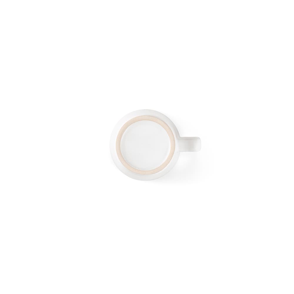 A ceramic mug with a white matt finish, featuring a round base and a handle. It has a simple design.