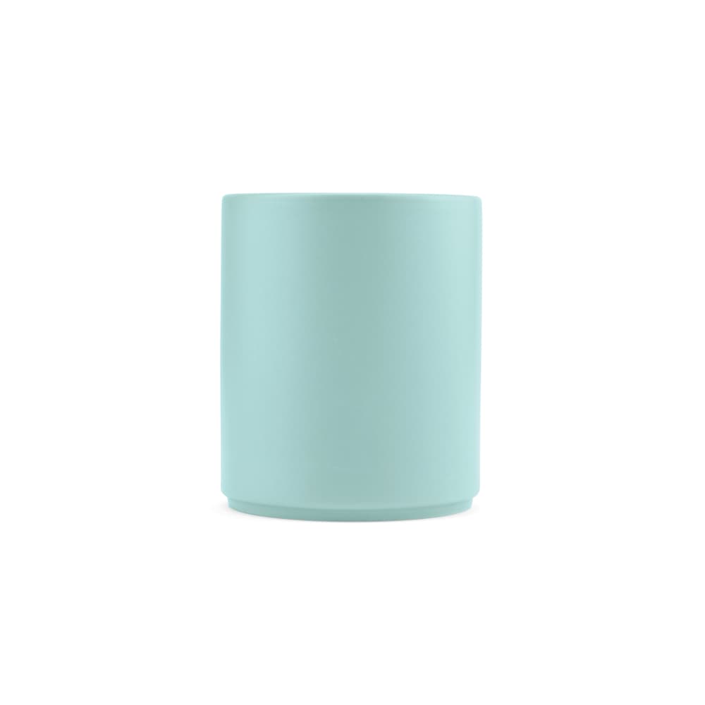A ceramic mug in a matte light blue finish, with a minimalist design and no visible branding.