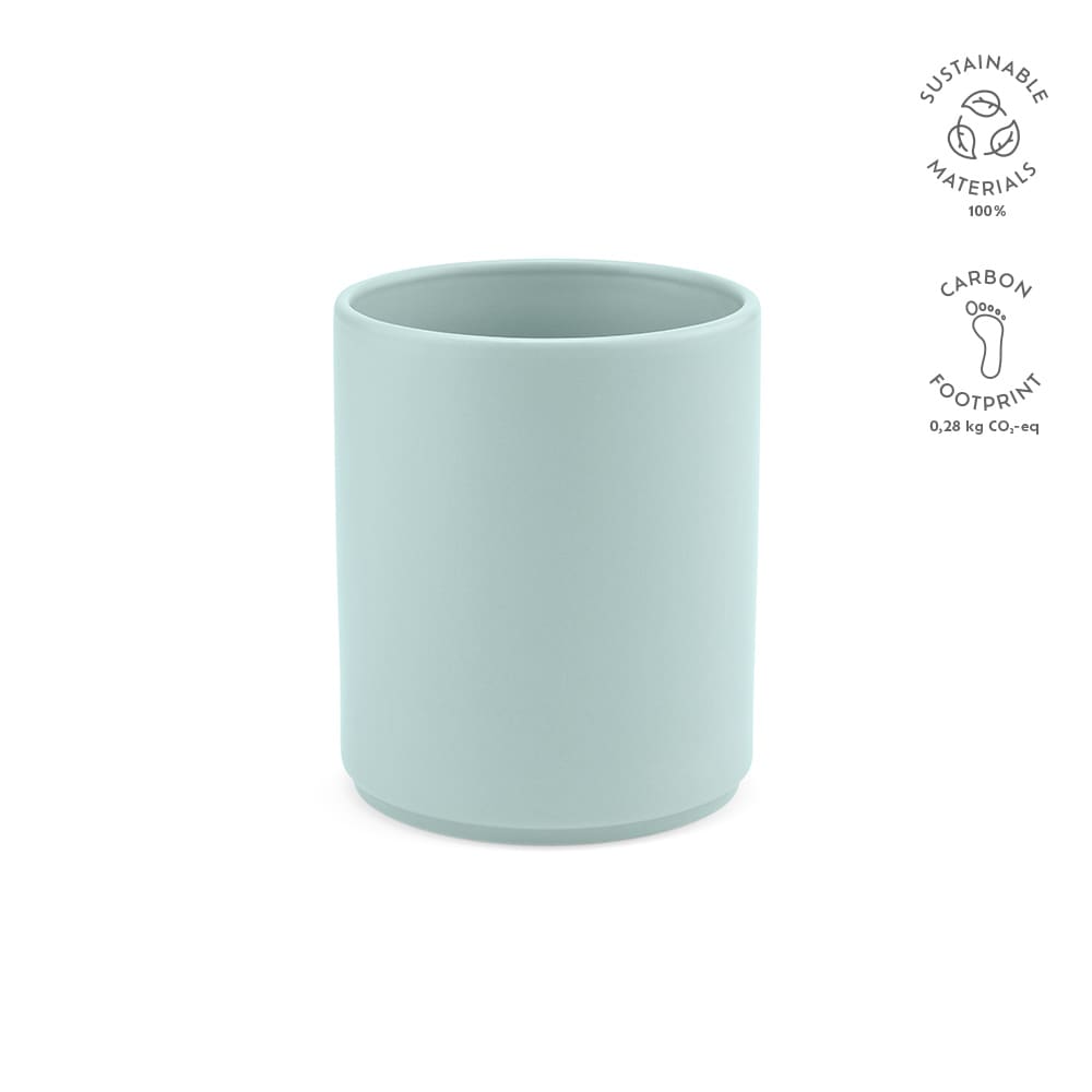 A ceramic mug with a matt finish in light green, featuring a logo and sustainability certifications.