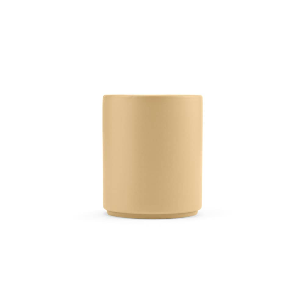 A ceramic mug with a matt finish, featuring a smooth, light brown surface and a circular base. It has a logo.