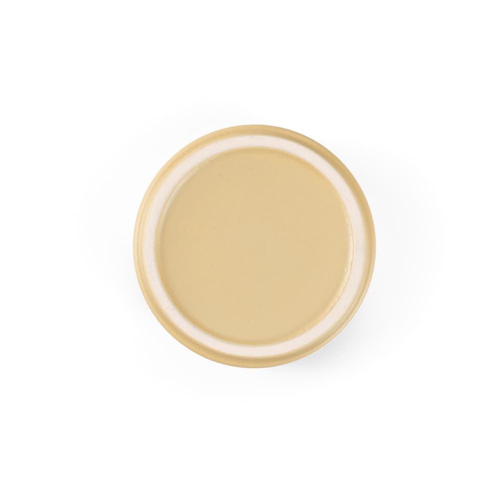 A ceramic mug with a matt finish in a light beige colour and a white rim, featuring a logo.