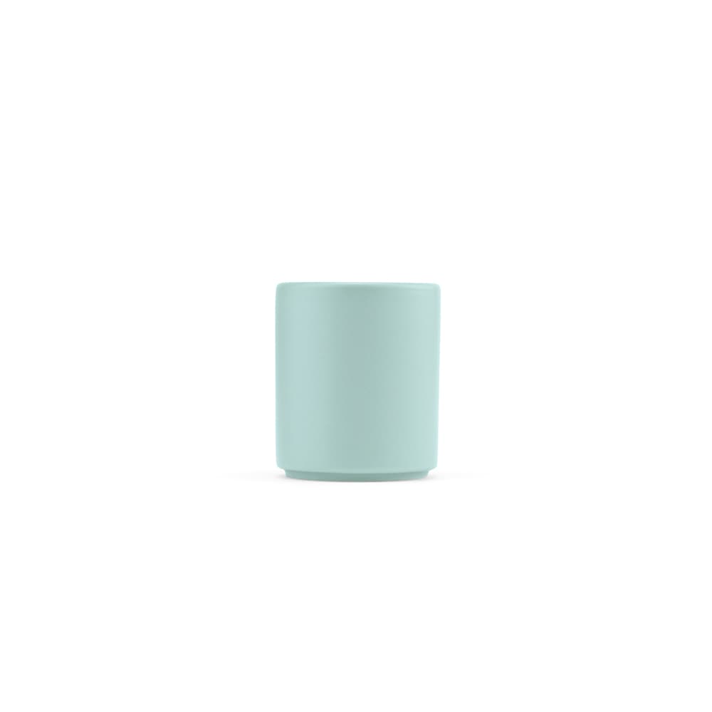 A ceramic mug with a matt finish in a soft mint green colour, featuring a logo. Holds 75 ml.