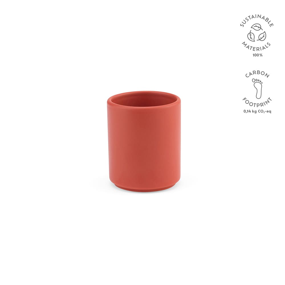 A ceramic mug with a matt finish, featuring a round shape in a terracotta hue. Includes a branding logo.