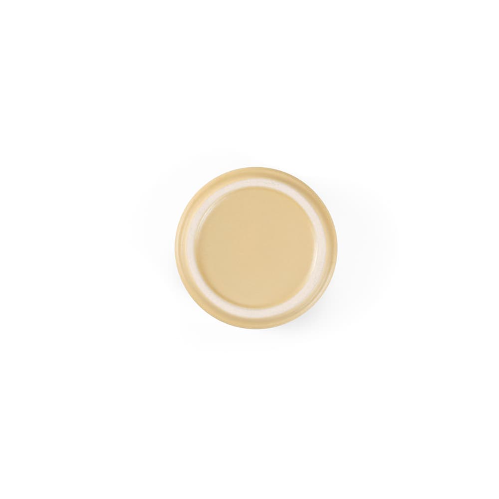 A ceramic mug with a matte finish in a light beige colour, featuring a logo.