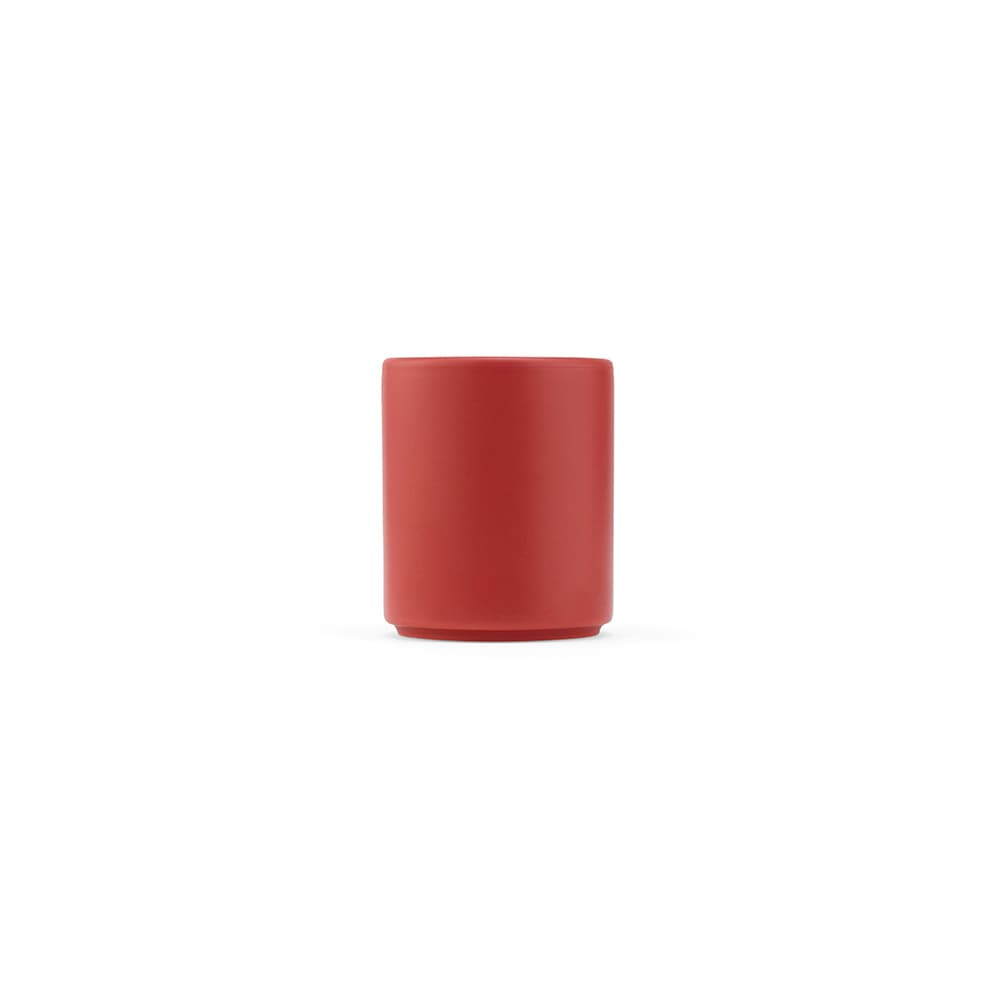 A ceramic mug with a matte finish in a vibrant red colour, featuring a simple cylindrical design.