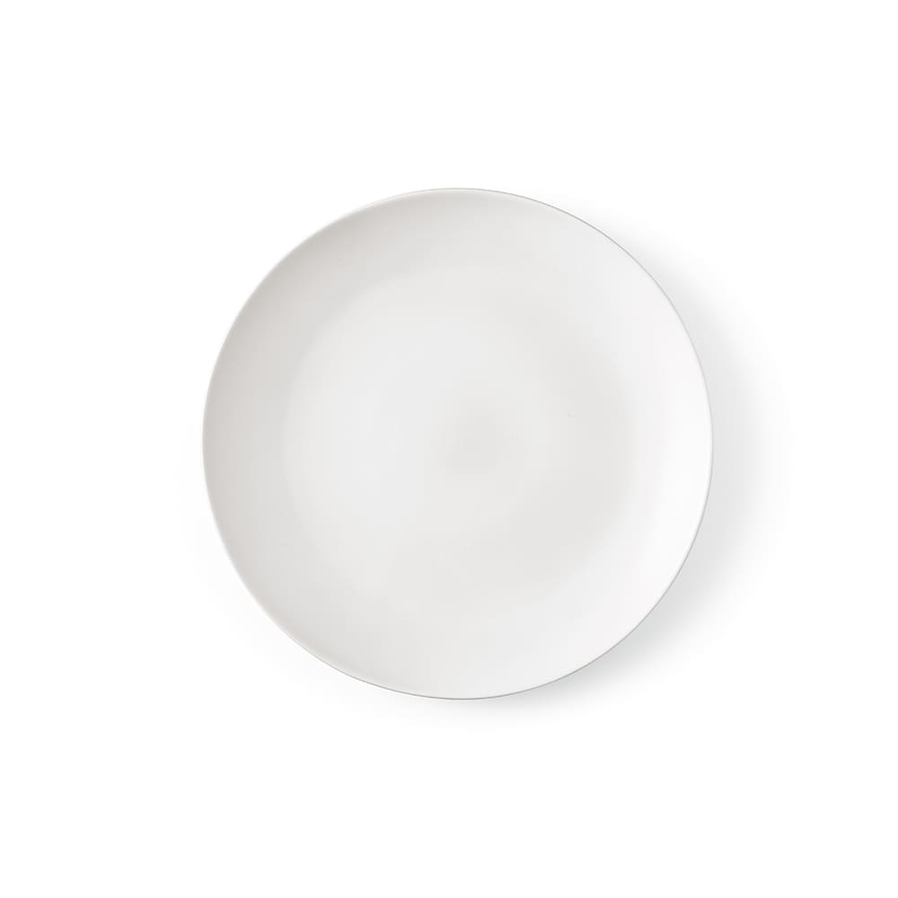 A ceramic dinner plate with a matte finish in white, made in Portugal, featuring a subtle design and a logo.