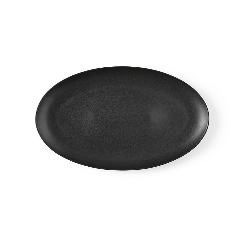 A ceramic platter with a matte black finish, featuring an oval shape and a subtle design. Made in Portugal.