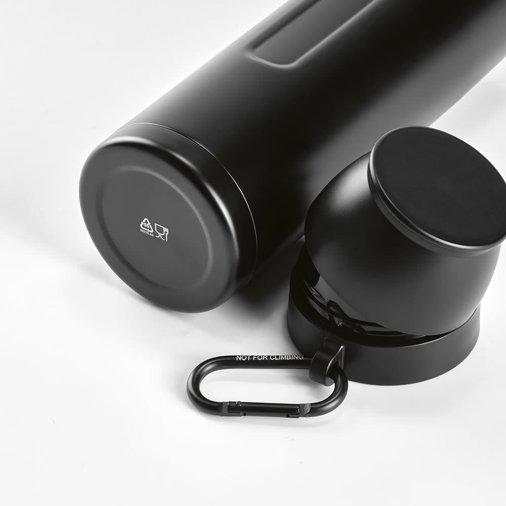 A drink bottle with a matte black finish, two black cups, and a carabiner attached for easy carrying.