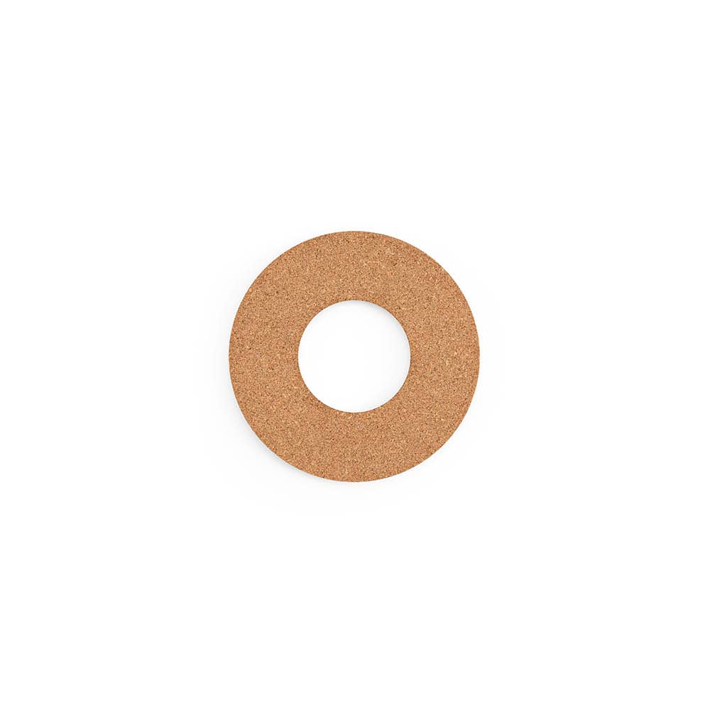 Round cork trivet in natural brown, featuring a hollow centre. Comes with branding. Made in Portugal.