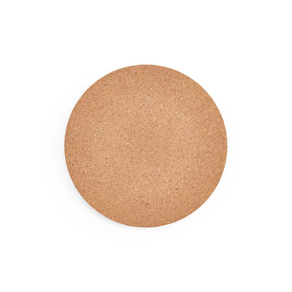 A round cork trivet in a natural beige colour, featuring a smooth surface and a simple design.