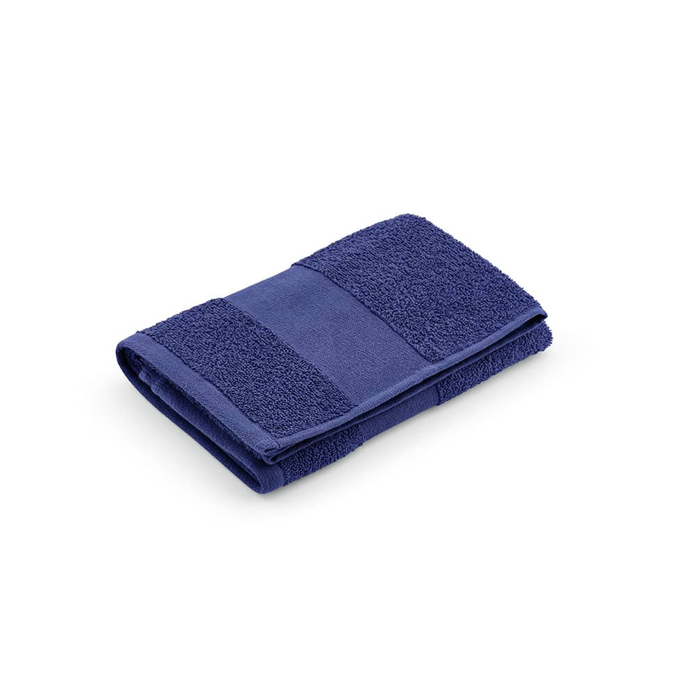 A folded dark blue towel featuring a combination of smooth and textured fabric. It has a logo design.