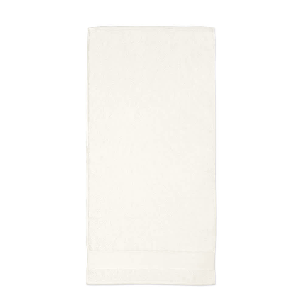 A white cotton towel with a textured border, featuring a logo. Made in Portugal, 370gsm.