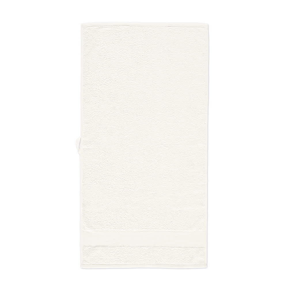 A white cotton towel, featuring a textured surface, labelled as Donatello M Towel rCotton 370gsm, made in Portugal.