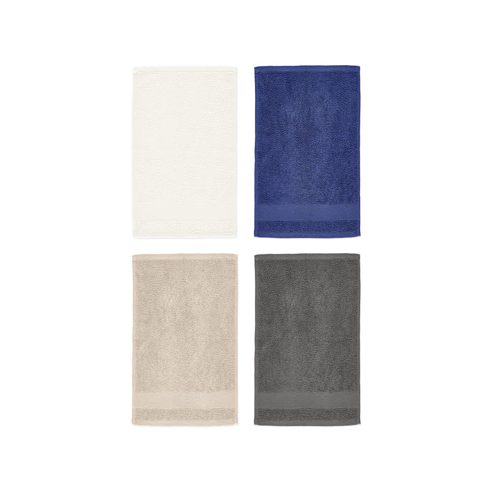 A collection of four towels in cream, navy, beige, and grey, each with a textured pattern. One towel features a logo.