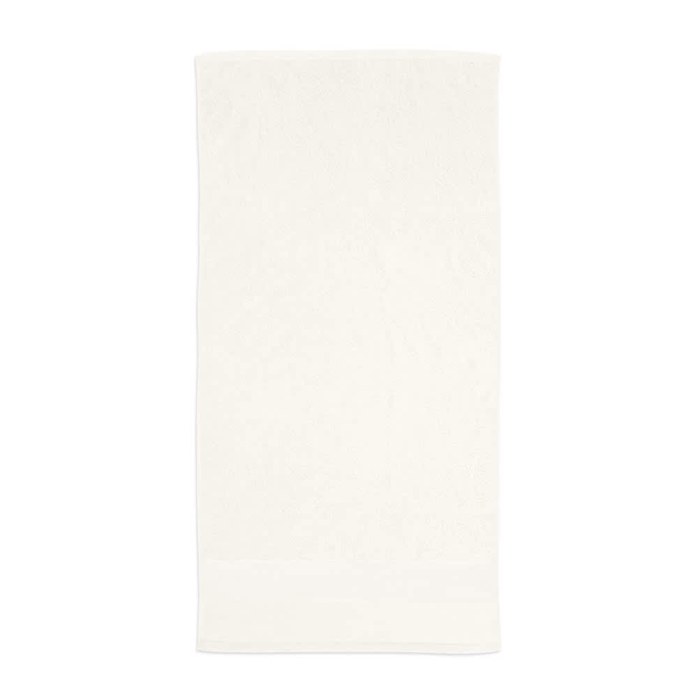 A soft, cream-coloured towel made from 500 gsm cotton. It features a logo and is made in Portugal.