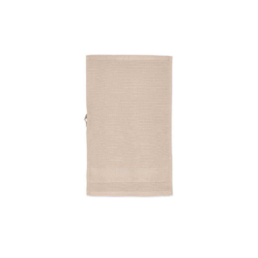 A beige cotton towel featuring a textured design, labelled as Botticelli S Towel, made in Portugal and has a logo.