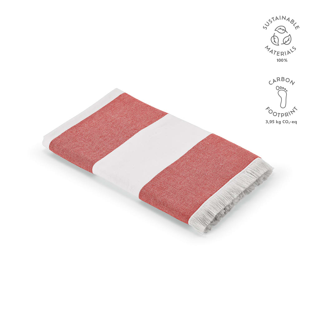 A folded towel with red and white stripes, featuring fringed edges. It has a branding logo on one side.