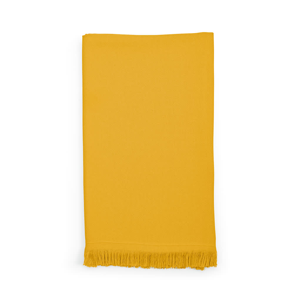 A vibrant yellow towel with fringed edges, made from cotton and featuring a logo.