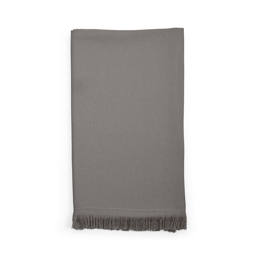 A grey towel with fringed edges, made from cotton, featuring a branding logo.