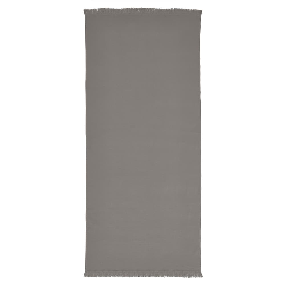A grey cotton towel with frayed edges, made in Portugal, featuring a logo.