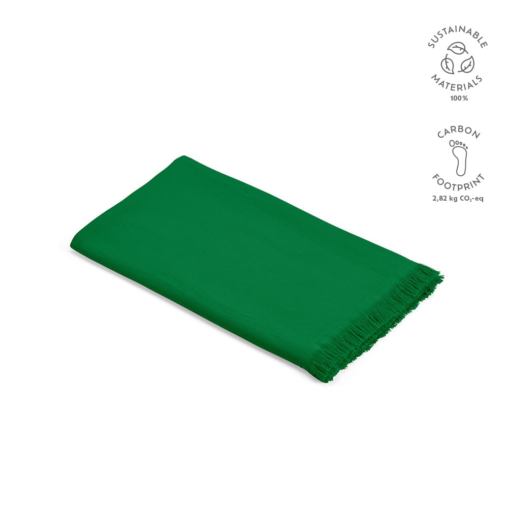 A green towel made from 100% sustainable materials, featuring fringed edges and a branding logo.