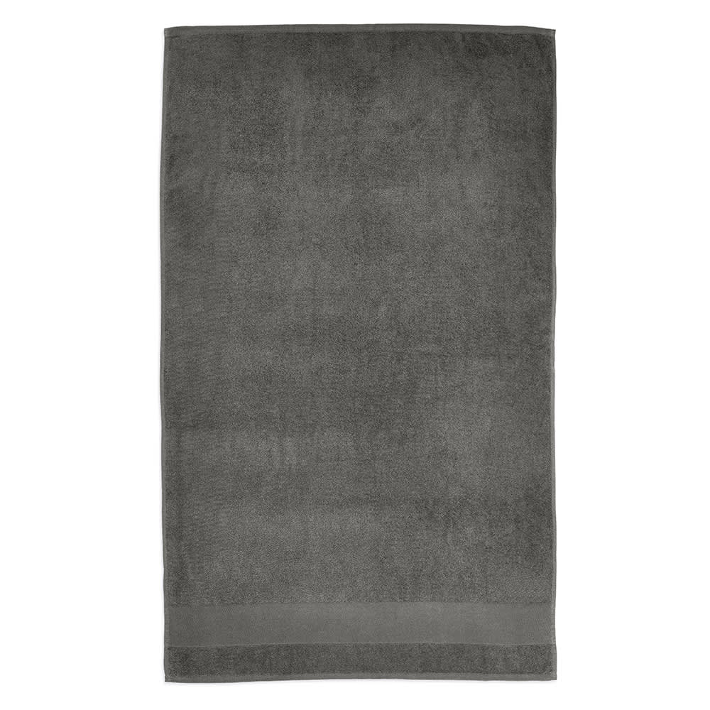 A grey towel, the Donatello XL Towel, made of cotton with a weight of 370gsm, featuring a simple design.