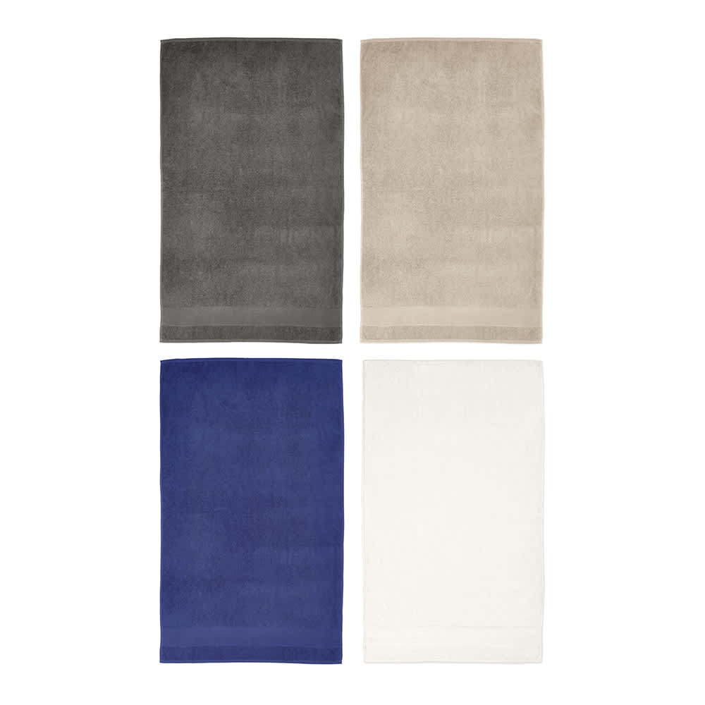 Four towels in various colours: dark grey, beige, navy blue, and white, each with a simple design and a logo.
