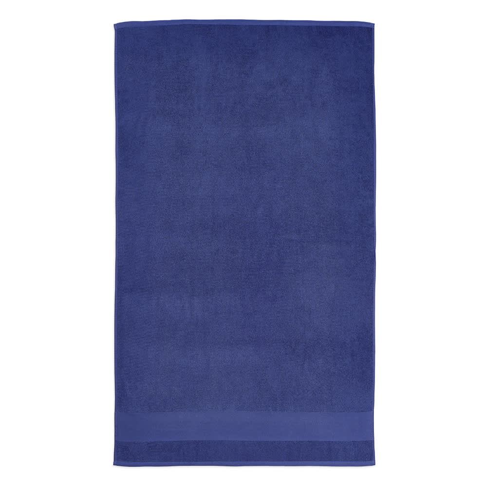 A dark blue towel made from recycled cotton, featuring a textured finish and a single logo.