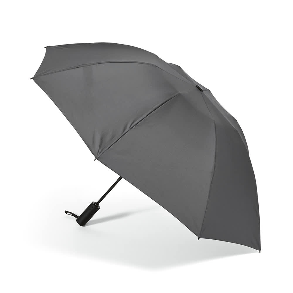 A grey foldable umbrella with a reversible closing mechanism and a compact handle. It has a logo on the handle.