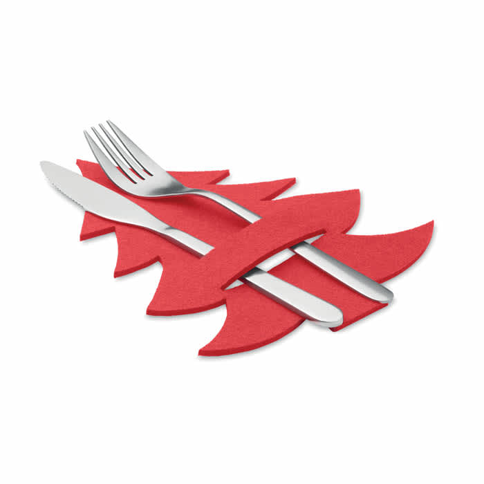 A red felt placemat in the shape of a Christmas tree, featuring a knife and fork laid atop it.