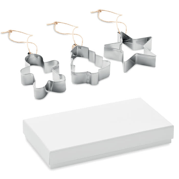 A set of three stainless steel cookie cutters in various shapes, packaged in a simple white box.