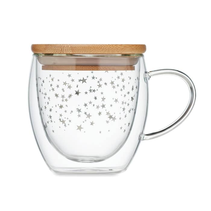 A glass mug with a starry pattern and a wooden lid, featuring a curved handle.