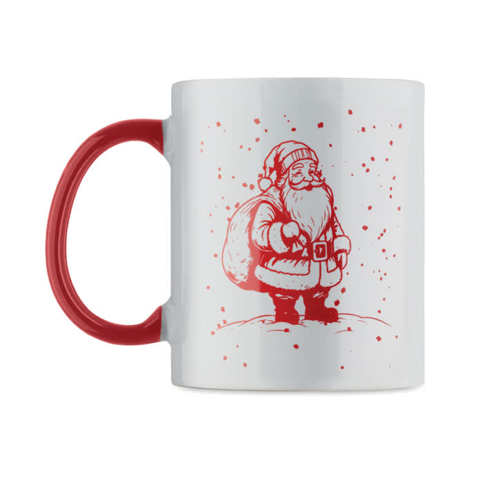 A white mug with a red handle featuring a Santa Claus illustration and scattered snowflakes.