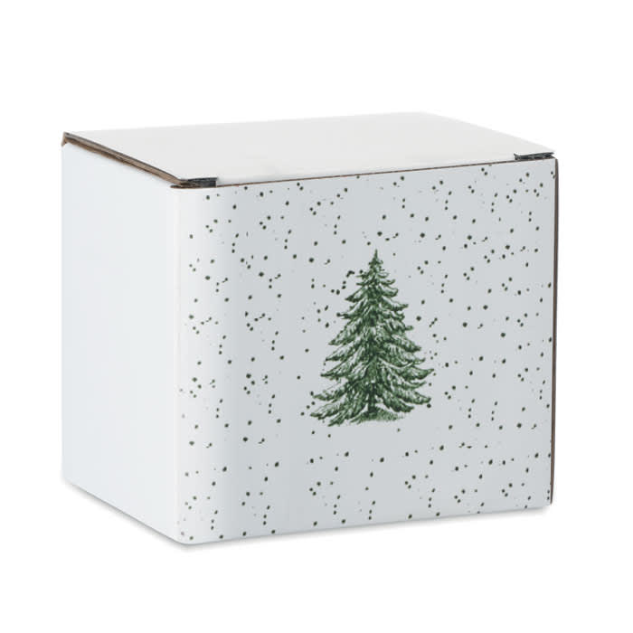 A white gift box decorated with a green Christmas tree and speckled patterns. The box has a simple, festive design.
