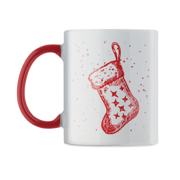 A festive mug featuring a red Christmas stocking design and a red handle on a white background.