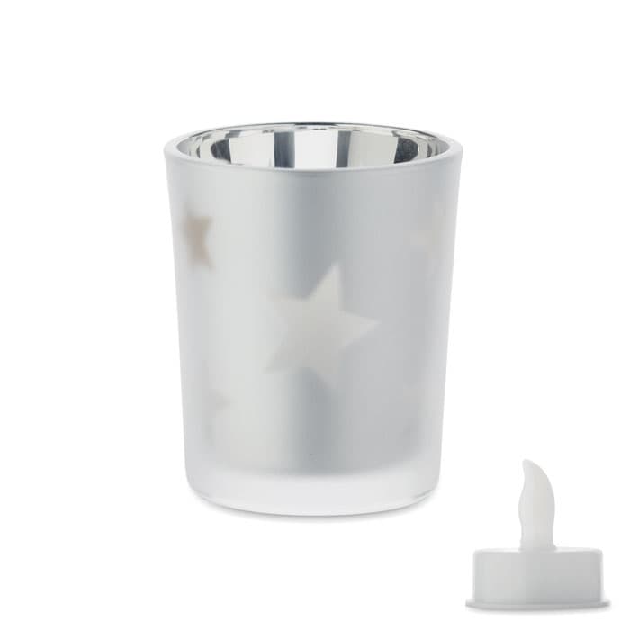A silver candle holder featuring star cut-outs, accompanied by a small white LED candle.