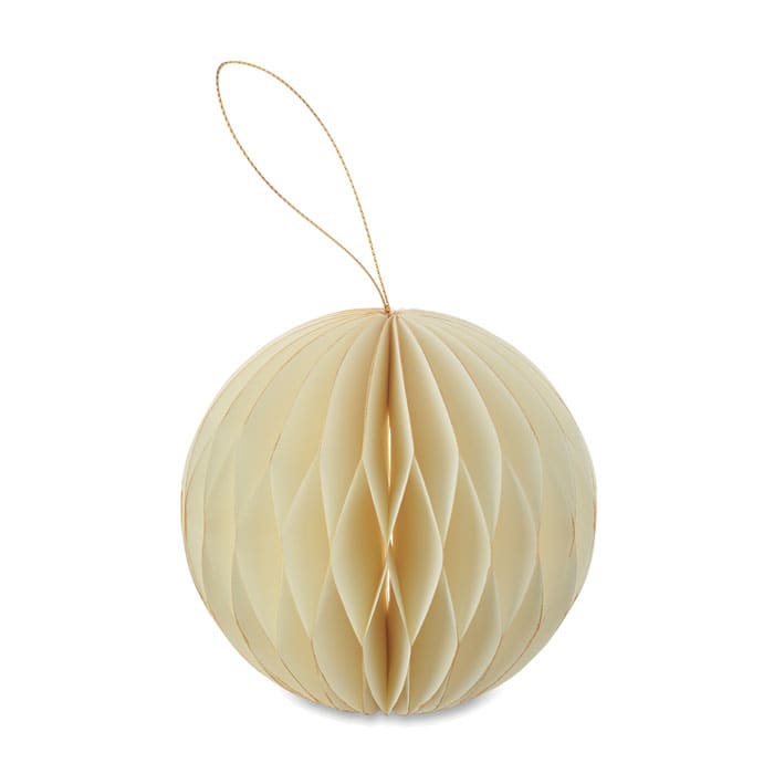 A decorative, cream-coloured paper honeycomb ornament with a gold string for hanging.