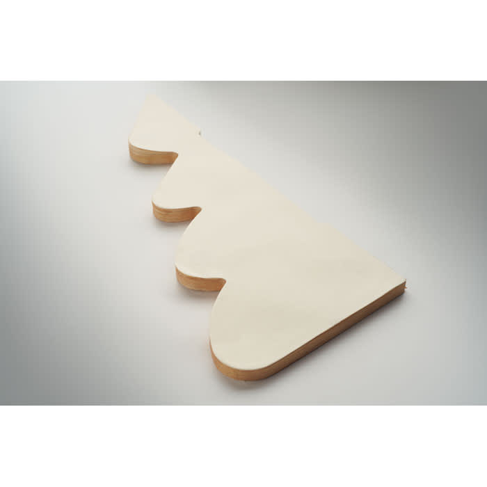 A decorative wooden shelf bracket in a light cream colour with a scalloped edge design.