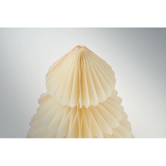 A decorative item with layered, fan-shaped cream-coloured elements, forming a cone shape at the top.