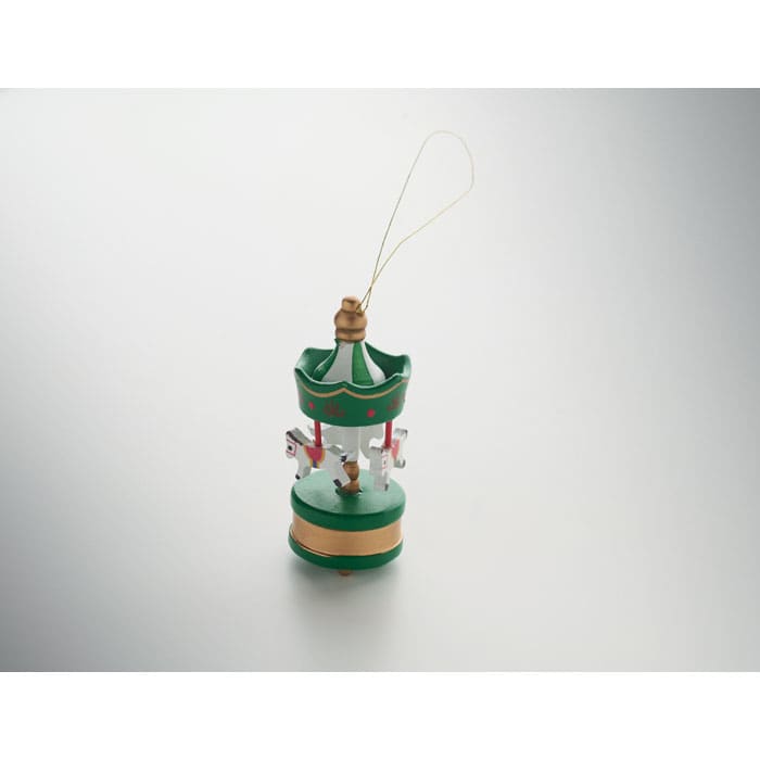A decorative carousel ornament in green, featuring small horses and a gold base, with a hanging loop.
